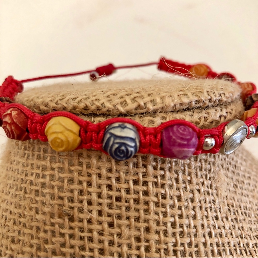 Beautiful red rosette multicolored bracelet